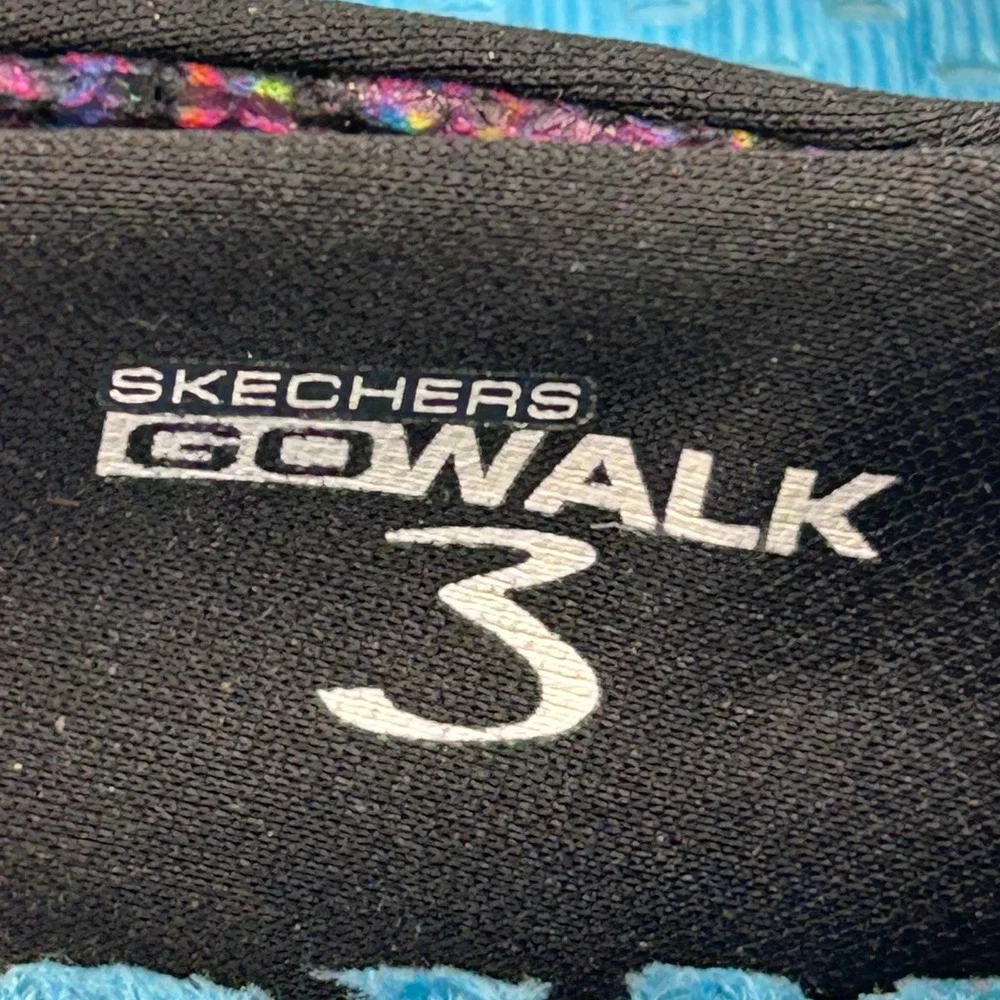 Skechers Women’s Slip-On Knit Sneakers in Black with Pink Accents